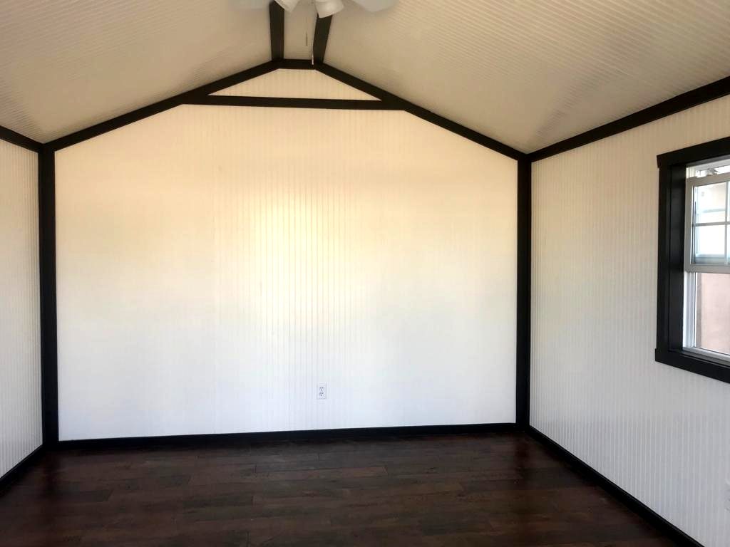 White beadboard walls with black trim