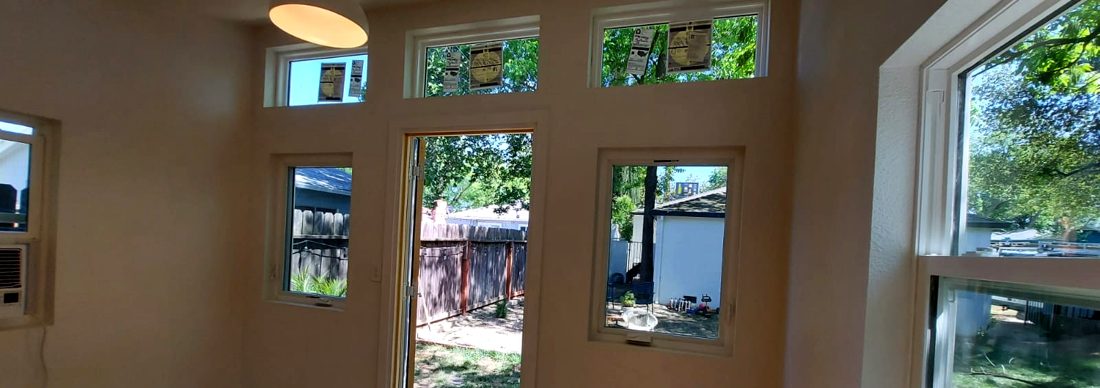 Modern studio with three transom windows